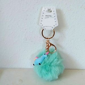 Mint puff keychain with rainbow and blue unicorn
